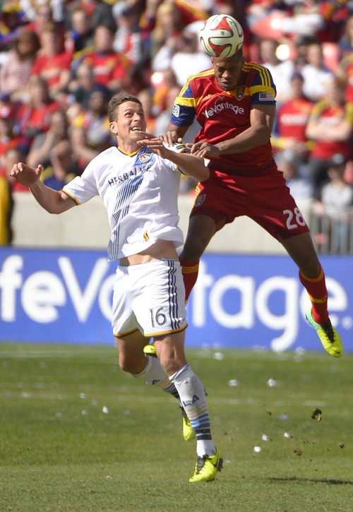 Leah Hogsten  |  The Salt Lake Tribune
Real Salt Lake defender Chris Schuler (28) gets the header over Los Angeles Galaxy forward Rob Friend (16). Real Salt Lake and the L.A. Galaxy's game ended in a 1-1 draw Saturday, March 22, 2014 during RSL's home opener at Rio Tinto Stadium.