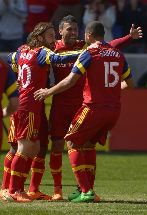 Leah Hogsten  |  The Salt Lake Tribune
Real Salt Lake midfielder Ned Grabavoy (20) and Real Salt Lake midfielder Javier Morales (11) celebrate Real Salt Lake forward Alvaro Saborio's  (15) first half goal. Real Salt Lake and the L.A. Galaxy are 1-1 at the half during Saturday's, March 22, 2014 home opener at Rio Tinto Stadium.