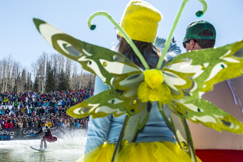 Chris Detrick  |  The Salt Lake Tribune
Alex Bertha 'Scottish Lad' competes in the pond skimming contest during the 7th annual Spring Grüv at Canyons Resort Saturday March 22, 2014. Contestants were required to dress in costumes as they attempted to cross a 100-foot pond on skis or a snowboard.
