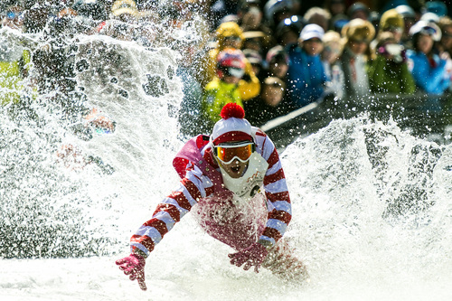 Chris Detrick  |  The Salt Lake Tribune
Joe Rosati 'Mr. Mint' competes in the pond skimming contest during the 7th annual Spring Gr¸v at Canyons Resort on Saturday. Contestants were required to dress in costumes as they attempted to cross a 100-foot pond on skis or a snowboard.