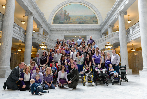 Franciso Kjolseth  |  The Salt Lake Tribune
Members of Hope 4 Children with Epilepsy along with families who have been affected by the disease gather for a group photograph at the Utah Capitol Tuesday, March 25, 2014. Gov. Gary R. Herbert signed a ceremonial version of HB105 to legalize the use of nonintoxicating cannabis oil by Utahns with untreatable epilepsy. Catrina and Jeff Nelson appear at the bottom center. The bill was named in honor of their daughter, Charlee, who lost a battle with Late Infant Batten Disease earlier this year.