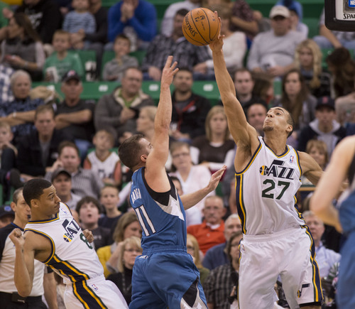 Lennie Mahler  |  The Salt Lake Tribune
Utah Jazz guard Diante Garrett is called for a foul as Rudy Gobert rejects a shot by Timberwolves guard JJ Barea in the first half of a game Saturday, Feb. 22, 2014, in Salt Lake City.
