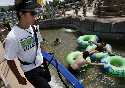 Francisco Kjolseth  |  Tribune file photo

Justin Brown at Lagoon keeps an eye on the lazy river at the waterpark.