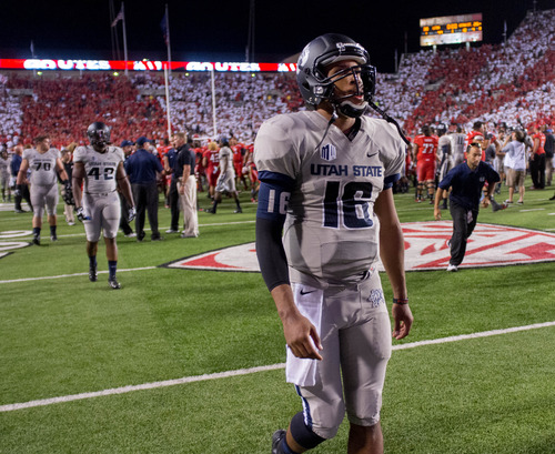 Trent Nelson  |  The Salt Lake Tribune
Utah State Aggies quarterback Chuckie Keeton (16) walks off the field after the loss as the University of Utah hosts Utah State, college football Thursday, August 29, 2013 at Rice-Eccles Stadium in Salt Lake City.