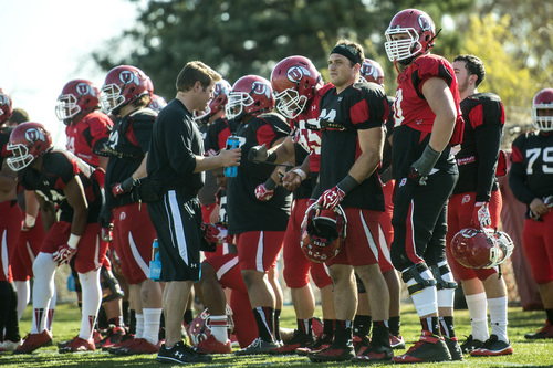 Chris Detrick  |  The Salt Lake Tribune
Utah's Jackson Barton, right, watches during a practice at the field west of the Spence & Cleone Eccles Football Center Wednesday March 26, 2014.