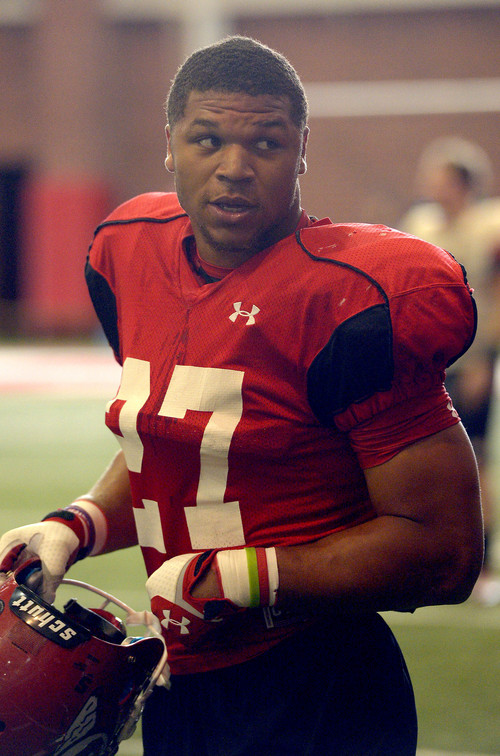 Leah Hogsten  |  The Salt Lake Tribune
University of Utah running back Devontae Booker runs through plays with during practice Thursday, March 27, 2014 inside the Spence Eccles Field House.