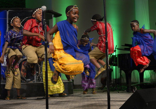Scott Sommerdorf   |  The Salt Lake Tribune
The African Children's Choir sings at Mountain View Christian Assembly Church, Sunday, March 30, 2014. The African Children's Choir performs lively African songs and dances, well-loved children's songs, traditional spirituals and gospel favorites.