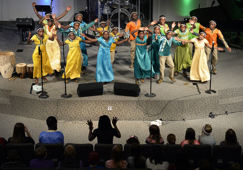 Scott Sommerdorf   |  The Salt Lake Tribune
The African Children's Choir sings at Mountain View Christian Assembly Church, Sunday, March 30, 2014. The African Children's Choir performs lively African songs and dances, well-loved children's songs, traditional spirituals and gospel favorites.