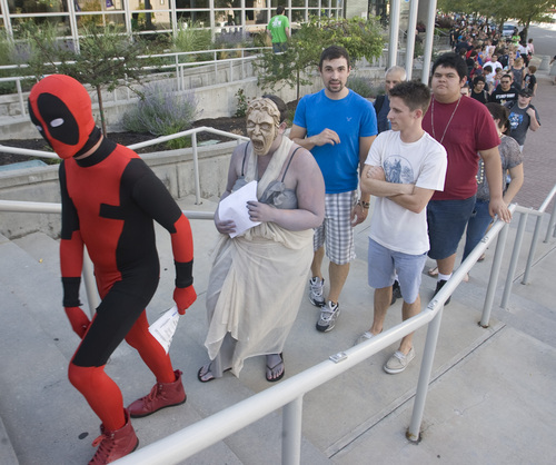 Rick Egan  |  Tribune file photo 

Hundreds wait in line to get into the Salt Lake ComiCon at the Salt Palace,  Wednesday, September 4, 2013.