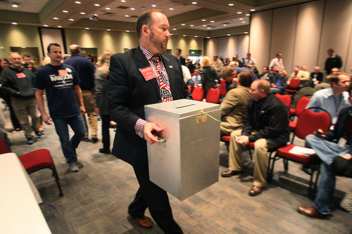 Scott Sommerdorf   |  Tribune file photo
At least 150 delegates elected during last months Republican caucuses were left off lists distributed to candidates. State Party Chairman James Evans says the problems were inadvertant and are being fixed. In this file photo, a voting box is moved after voting by the Republican State Central Committee.