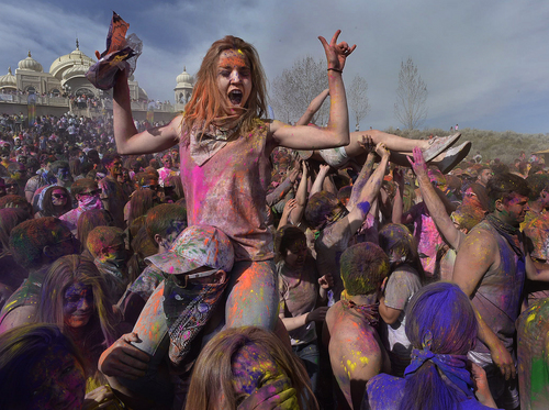 Scott Sommerdorf   |  The Salt Lake Tribune
The Holi festival of colors at the Sri Radha Krishna Temple in Spanish Fork, Saturday, March 29, 2014. Revelers celebrate the arrival of spring on the grounds of the temple.