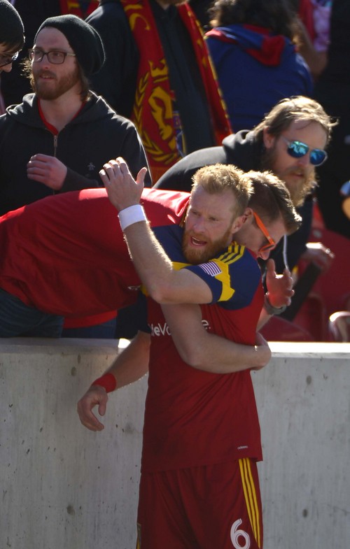 Leah Hogsten  |  The Salt Lake Tribune
Real Salt Lake defender Nat Borchers (6) is mobbed by fans after the game. Real Salt Lake and the L.A. Galaxy's game ended in a 1-1 draw Saturday, March 22, 2014 during RSL's home opener at Rio Tinto Stadium.