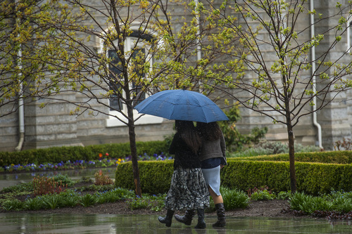 Chris Detrick  |  The Salt Lake Tribune
Two Sister Missionaries with The Church of Jesus Christ of Latter-day Saints share an umbrella while walking around Temple Square in Salt Lake City Wednesday April 2, 2014.