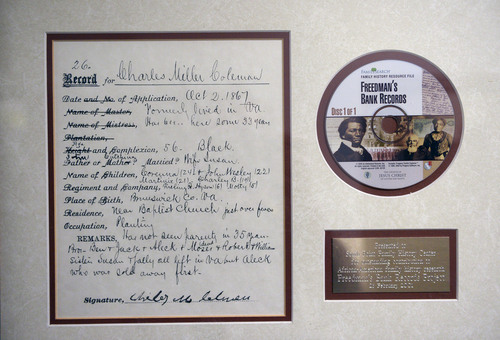 Al Hartmann  |  The Salt Lake Tribune 
Plaque presented to the South Point History Center at the Utah State Prison for outstanding contribution to African American family history from Freedman's Bank Records Project.