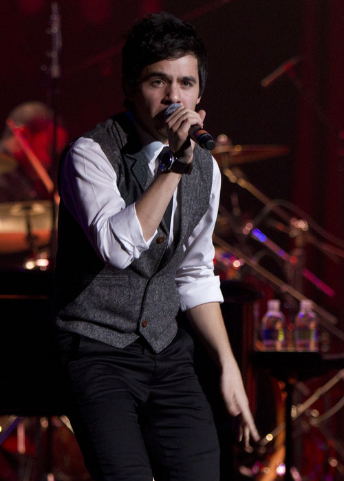 Jim Urquhart | Special to the Salt Lake Tribune

David Archuleta headlines Abravanel Hall for a Christmas show on his "My Kind of Christmas"
tour Monday, Dec.19, 2011 in Salt Lake City
The Murray native David Archuleta performed as part of his "My Kind of Christmas" tour that began in New York earlier in the month. Archuleta's holiday tour is based on his 2009 album "Christmas From the Heart," and he also performed some of his most well-known contemporary hits. He plans on recording his next album in 2012. In May 2008 he finished second in the televised competition show "American Idol."