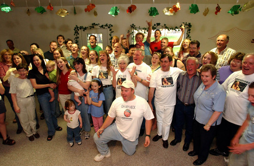 | Tribune File Photo
Family and friends of Neleh Dennis celebrate Neleh making the final four of survivor after watching the the episode  (82 people total) at the dennis home thursday night.