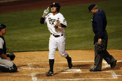 Salt Lake's Brad Coo, points upward after hitting a solo home run during the Bees' 6-2 victory over Reno on Friday night.
 
Chris Detrick/The Salt Lake Tribune