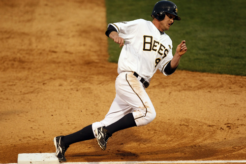 Salt Lake's Brad Coon rounds third base and is headed home for a Bees run.
 
Chris Detrick/The Salt Lake Tribune