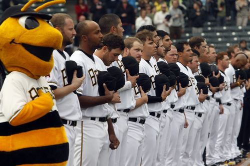 Chris Detrick  |  The Salt Lake Tribune
Members of the Bees team during the National Anthem before the opening day game at Spring Mobile Ballpark Thursday April 4, 2013.
