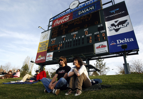 Chris Detrick | The Salt Lake Tribune

Nick Johnson, 18, left, and Mallorie Grappendorf, 16, watch from behind the right-field fence as the Bees play the Las Vegas 51's during the season opener in 2007.
