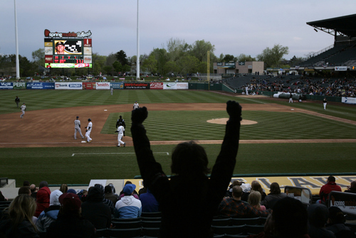Kim Raff | The Salt Lake Tribune
Bees fans cheer as Mike Trout hits a triple during the Bees home opener against Tucson Padres at Spring Mobile Ballpark in Salt Lake City, Utah on April 13, 2012.
