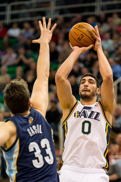 Trent Nelson  |  The Salt Lake Tribune
Utah Jazz center Enes Kanter (0) shoots over Memphis Grizzlies center Marc Gasol (33) as the Utah Jazz face the Memphis Grizzlies, NBA basketball at EnergySolutions Arena in Salt Lake City, Wednesday, March 26, 2014.