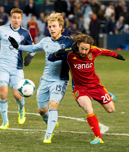 Trent Nelson  |  The Salt Lake Tribune
Real Salt Lake's Ned Grabavoy (20) defended by Sporting KC's Seth Sinovic (15) as Real Salt Lake faces Sporting KC in the MLS Cup Final at Sporting Park in Kansas City, Saturday December 7, 2013.