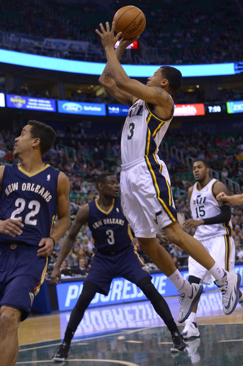 Leah Hogsten  |  The Salt Lake Tribune
Utah Jazz guard Trey Burke (3) for two. The Utah Jazz are behind the New Orleans Pelicans 45-43 at the half of their game Friday, April 4, 2014 at Energy Solutions Arena.