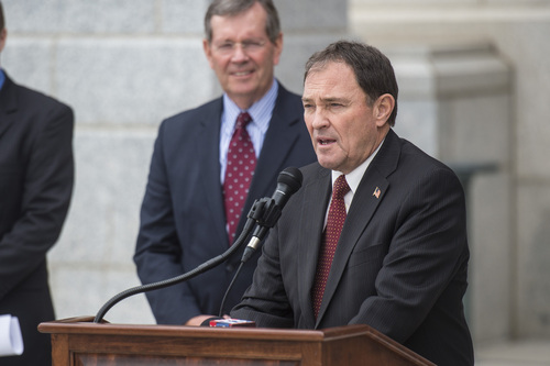 Chris Detrick  |  The Salt Lake Tribune
Former Gov. Mike Leavitt listens as Gov. Gary Herbert speaks during a ceremony marking the 100th anniversary of the laying of the cornerstone of the Utah State Capitol Friday, April 4, 2014.