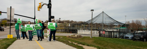 Trent Nelson  |  The Salt Lake Tribune
South Jordan residents are attempting to save Mulligans Golf Course and the open space it sits on, all owned by South Jordan, from development. Citizens held signs to raise awareness with passing motorists in South Jordan, Saturday March 29, 2014.