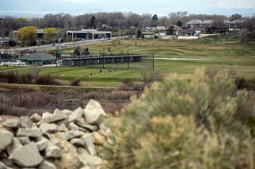 Chris Detrick  |  The Salt Lake Tribune
Golfers use the driving range at Mulligans Golf and Games as seen from the undeveloped land across from the South Jordan Station at 10351 South Jordan Gateway Thursday April 3, 2014.