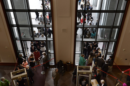 Scott Sommerdorf   |  The Salt Lake Tribune
People enter the conference center and go through metal detectors prior to the morning session of the 184th General Conference of the Church of Jesus Christ of Latter Day Saints, Sunday, April 6, 2014.