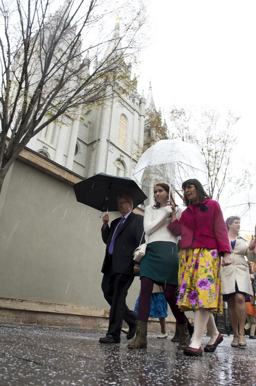 Steve Griffin  |  The Salt Lake Tribune


Members and supporters of the Ordain Women, led by Hannah Wheelwright and Kate Kelly, walk in front of the Temple on their way to the Tabernacle on Temple Square to seek standby tickets to the all-male general priesthood meeting in Salt Lake City, Utah Saturday, April 5, 2014.