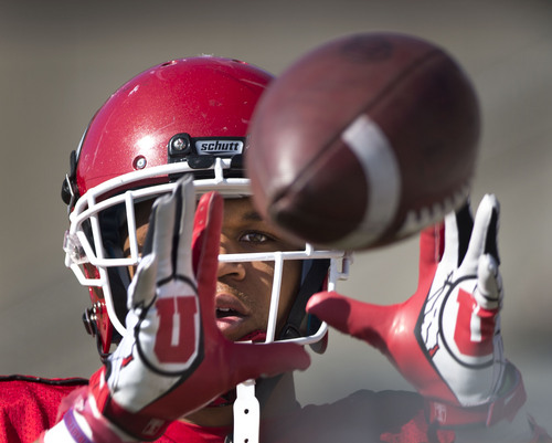 Steve Griffin  |  The Salt Lake Tribune


University of Utah defensive back Tyron Morris-Edwards catches footballs thrown at him from a pitching machine during spring football practice at the Spence Eccles Football Facility in Salt Lake City, Utah Tuesday, April 8, 2014.