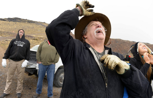 Leah Hogsten  |  The Salt Lake Tribune
Robert Kirby (center) and friend Sonny Dyle (left) draw laughter from friends and onlookers as they shoot bowling balls from a cannon they recently bought, Saturday, April 5, 2014 in Rush Valley, Utah.