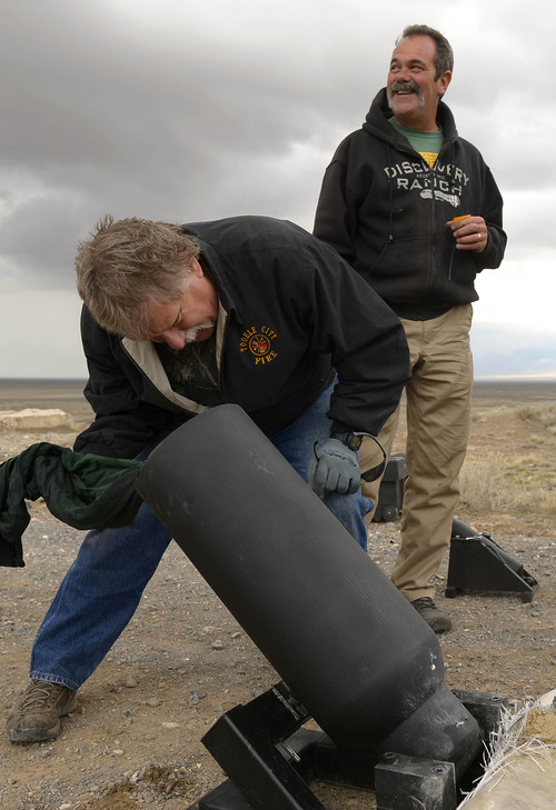 Leah Hogsten  |  The Salt Lake Tribune
l-r Robert Kirby and friend Sonny Dyle shoot bowling balls from a cannon they recently bought, Saturday, April 5, 2014 in Rush Valley, Utah.