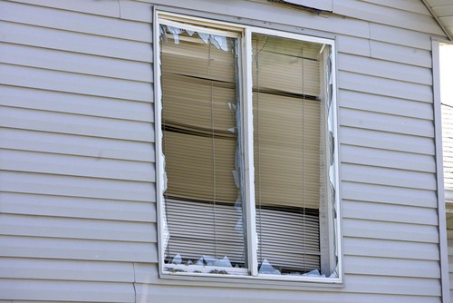 Paul Fraughton  |  The Salt Lake Tribune
Glass is shattered in a rear window at the home of Linda Wood as a result of an explosion at the Silver Eagle Refinery on Wednesday, Nov. 4, 2009.