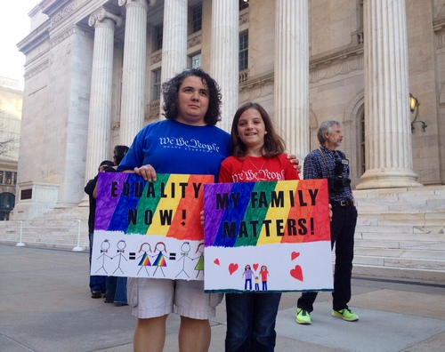 Marissa Lang | Salt Lake Tribune 

Veronica Guitierrez, left, stands with her 9-year-old daughter Lillian
Guitierrez at Wednesday's rally outside the 10th Circuit Court of
Appeals in Denver. Lillian made the signs to represent her family and
show that marriage matters to her moms.