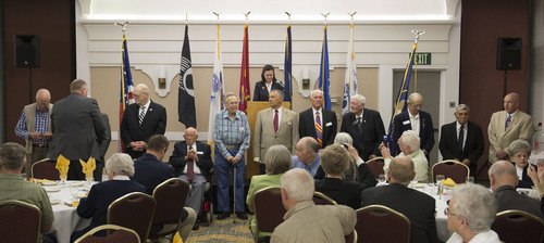 Steve Griffin  |  The Salt Lake Tribune


Former prisoners of war are honored during the Former POW Recognition Day luncheon at the Salt Lake Double Tree by Hilton in Salt Lake City Friday, April 11, 2014. The event is held each year on April 9, the day that a starving and exhausted U.S. military force at Bataan in the Philippines surrendered to the invading Japanese during World War II. Ten thousand American soldiers were marched some 70 miles to a POW camp. An estimated 600 to 650 service members died along the way. The rest faced years of brutal and deadly captivity in the Philippines and Japan. Some are stilled considered missing in action.