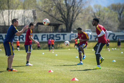 Chris Detrick  |  The Salt Lake Tribune
Real Salt Lake Head Athletic Trainer Tyson Pace works with Robbie Findley (10) Luis Gil (21) and Joao Plata (8) during a practice at America First Field Wednesday April 9, 2014.