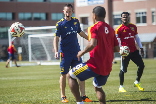 Chris Detrick  |  The Salt Lake Tribune
Real Salt Lake Head Athletic Trainer Tyson Pace works with Joao Plata (8) and Robbie Findley (10) during a practice at America First Field Wednesday April 9, 2014.
