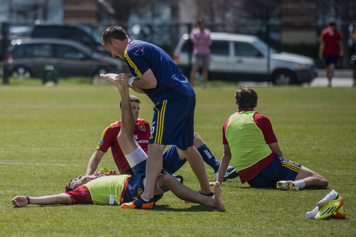 Chris Detrick  |  The Salt Lake Tribune
Real Salt Lake Head Athletic Trainer Tyson Pace works with John Stertzer (27) during a practice at America First Field Wednesday April 9, 2014.