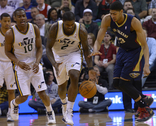 Leah Hogsten  |  The Salt Lake Tribune
Utah Jazz forward Marvin Williams (2) makes the steal on New Orleans Pelicans forward Anthony Davis (23). The Utah Jazz defeated the New Orleans Pelicans 100-96 during their game Friday, April 4, 2014 at Energy Solutions Arena.