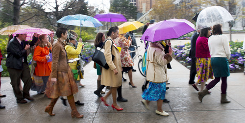 Steve Griffin  |  The Salt Lake Tribune


Members and supporters of the Ordain Women, led by Hannah Wheelwright and Kate Kelly, right, brave a hail storm as they walk to the Tabernacle on Temple Square to seek standby tickets to the all-male general priesthood meeting in Salt Lake City, Utah Saturday, April 5, 2014.