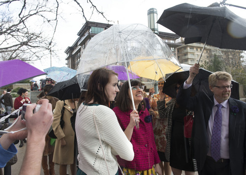 Steve Griffin  |  The Salt Lake Tribune


Members and supporters of the Ordain Women, led by Hannah Wheelwright and Kate Kelly, center, brave a hail storm as they walk to the Tabernacle on Temple Square to seek standby tickets to the all-male general priesthood meeting in Salt Lake City, Utah Saturday, April 5, 2014.