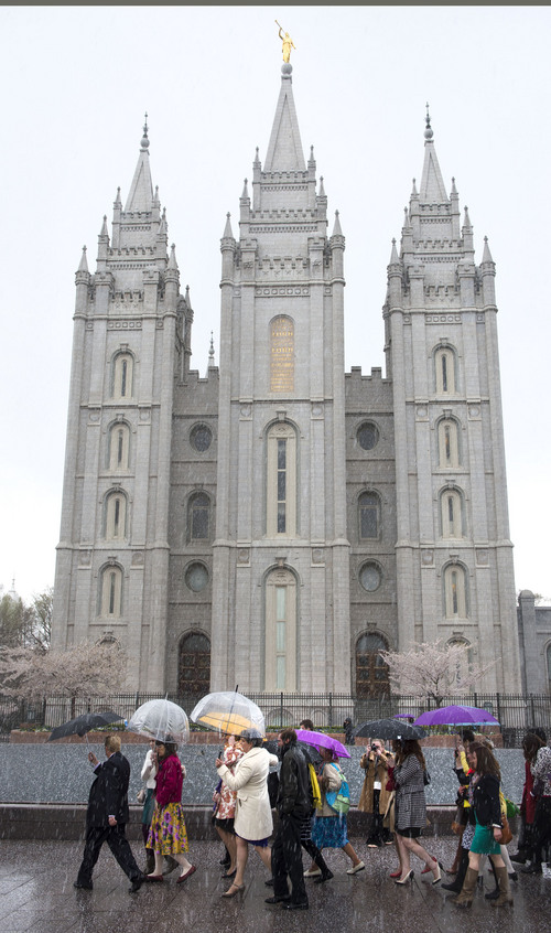 Steve Griffin  |  The Salt Lake Tribune


Members and supporters of the Ordain Women walk in front of the Temple on their way to the Tabernacle on Temple Square to seek standby tickets to the all-male general priesthood meeting in Salt Lake City, Utah Saturday, April 5, 2014.