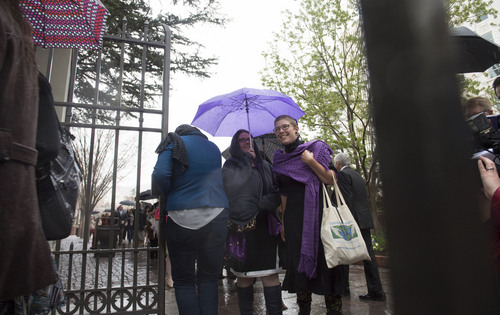Steve Griffin  |  The Salt Lake Tribune


Members and supporters of the Ordain Women walk through the gates on Temple Square on their way to the Tabernacle on Temple Square to seek standby tickets to the all-male general priesthood meeting in Salt Lake City, Utah Saturday, April 5, 2014.