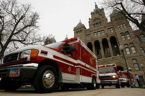 Ambulance services are among the medical providers getting millions from Medicare to carry older patients to Utah hospitals. In this 2006 photo, 
14 new ambulances parade in front of the Salt Lake City/County Building.
Chris Detrick/Salt Lake Tribune