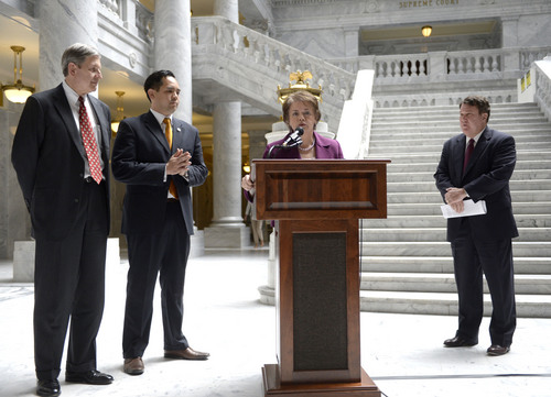 Al Hartmann  |  The Salt Lake Tribune
State Senator Margaret Dayton, at podium introduces Utah Attorney General Sean Reyes and Gene Schaer, left, who represented the state off Utah in Tenth Circuit Court joined citizens in the Eagle Forum and other supporters of the defense of Amendment 3 at the Utah Capitol rotunda Friday April 11.  Rep. LaVar Christensen, who was instrumental in Utah consitutuional amendment 3, right.