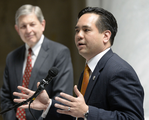 Al Hartmann  |  The Salt Lake Tribune
Utah Attorney General Sean Reyes, right, speaks to supporters at a rally of the defense of Amendment 3 at the Utah Capitol rotunda Friday April 11.  Gene Schaer, who represented the state of Utah in Tenth Circuit Court in the defense of Amendment 3, left.